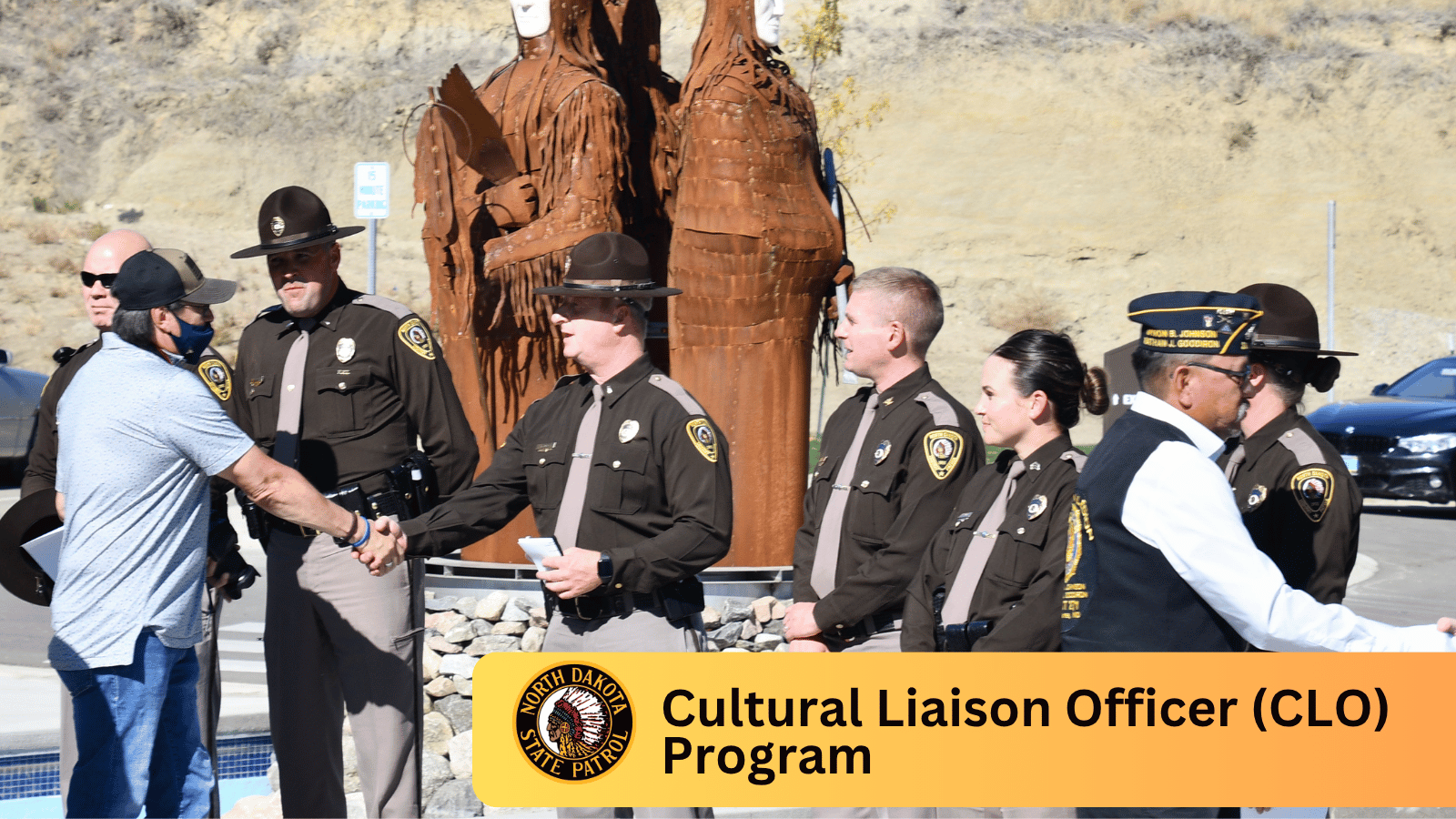 NDHP Officers in a receiving line with Tribal Members of MHA Nation