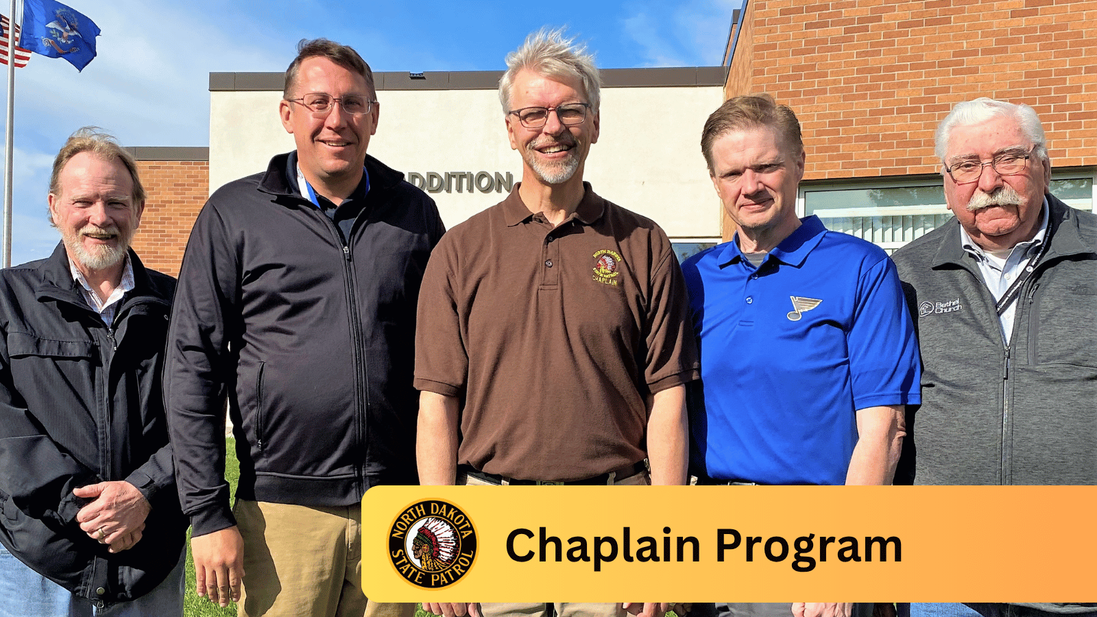 Five of the agency Chaplain program standing in front of the LETA