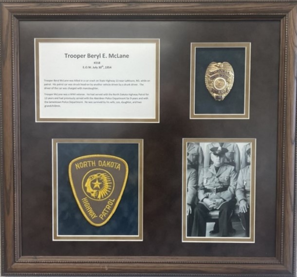 McLane memorial plaque at the LETA